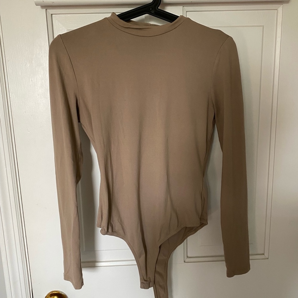 Tan long sleeve bodysuit. Size S